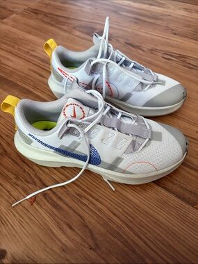 Nike Kids Light Gray Sneakers with Blue Swoosh & Neon Yellow Heel